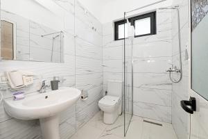 Koupelna v ubytování Hotel Fama