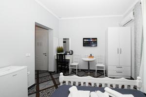 TV a/nebo společenská místnost v ubytování Hotel Fama