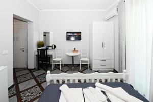 Postel nebo postele na pokoji v ubytování Hotel Fama