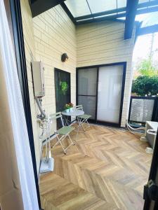 Balkón nebo terasa v ubytování Dc桜の苑-天下茶屋别府