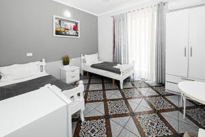 Koupelna v ubytování Hotel Fama + 37 fotografií