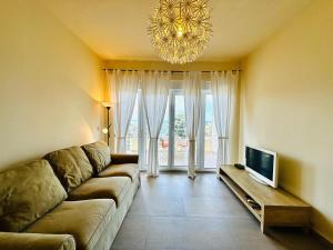 TV a/nebo společenská místnost v ubytování Beach Bliss
