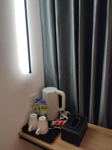 Příslušenství pro přípravu čaje a kávy v ubytování T Hotel SP Pekan Lama