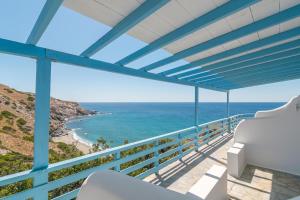 a view of the ocean from the balcony of a house at Thalassopetra in Agia Kyriaki in Agia Kiriaki Beach