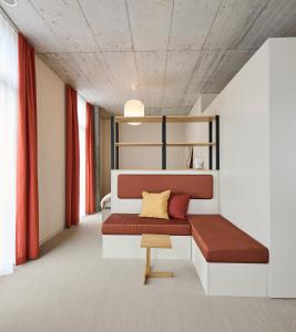 Posteľ alebo postele v izbe v ubytovaní Ariv Design Hotel Zug