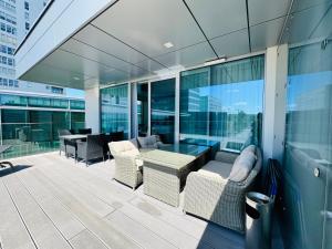 Posedenie v ubytovaní Apartament Faltom 26 Yacht Park z tarasem
