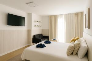 Postel nebo postele na pokoji v ubytování Habitación en ático dúplex