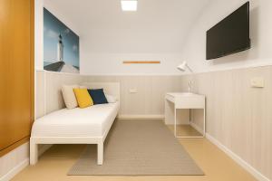 TV a/nebo společenská místnost v ubytování Habitación en ático dúplex