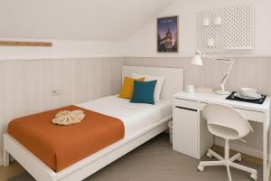 Postel nebo postele na pokoji v ubytování Habitación en ático dúplex