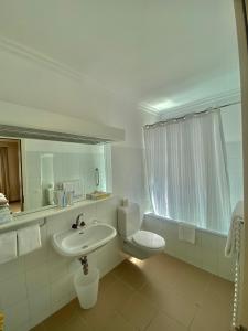 Koupelna v ubytování Hotel De La Paix