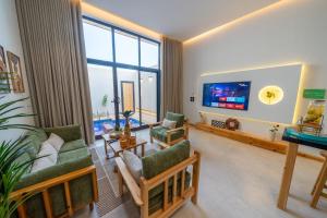 Et tv og/eller underholdning på شاليهات سكاي لاين - skyline chalets