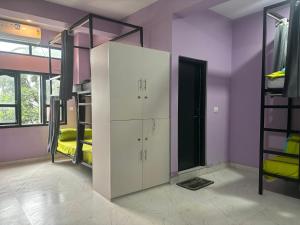 Postel nebo postele na pokoji v ubytování Cheklaa-a Backpacker's Hostel