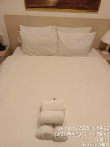 Postel nebo postele na pokoji v ubytování Starlight Hotel
