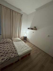 Postel nebo postele na pokoji v ubytování Perfekt group