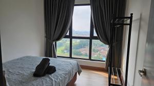Postel nebo postele na pokoji v ubytování Newly Furnished Home! TrivesHome Remia Residensi GM Port Klang