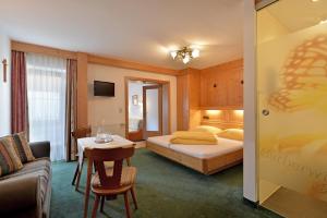 Voodi või voodid majutusasutuse Hotel Garberwirt toas