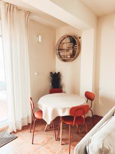 a dining room with a table and chairs at Rooftop 24 in Calpe