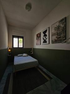 Postel nebo postele na pokoji v ubytování Villa Panoramica Sunset House