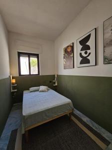 Postel nebo postele na pokoji v ubytování Villa Panoramica Sunset House