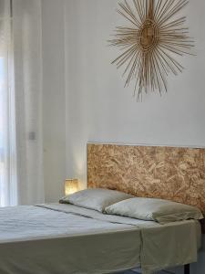Postel nebo postele na pokoji v ubytování Villa Panoramica Sunset House