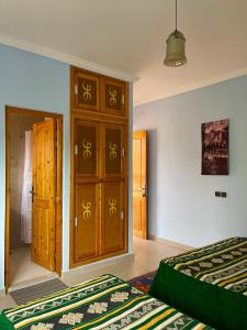 Postel nebo postele na pokoji v ubytování Dyafat Abla + 3 fotografie