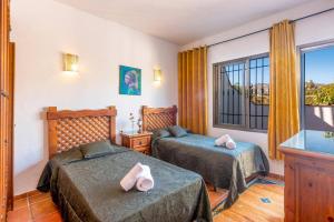 Postel nebo postele na pokoji v ubytování Villa Paraiso by Villa Plus