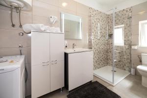 Koupelna v ubytování Apartments Mikanović