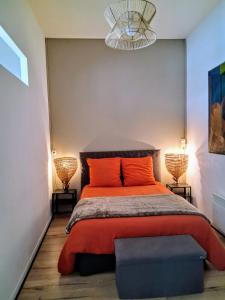 Ένα ή περισσότερα κρεβάτια σε δωμάτιο στο COSY ZEN HYPER CENTRE APARTMENT***