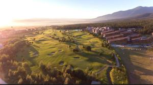 an aerial view of a golf course at Apartment 78 by the pool in Bansko