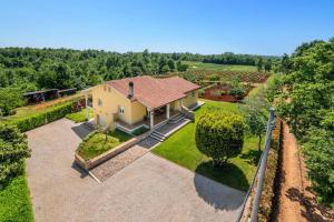 an aerial view of a house with a garden at Villa Zupan by Villa Plus in Vranići