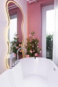 Ένα ή περισσότερα κρεβάτια σε δωμάτιο στο Ari Boutique Hotel