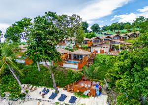 an aerial view of a resort with a beach at Ten Moons Sunset Villas in Ko Lipe