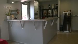a counter on a wall in a room at Chalet Marin et son spa privatif in Jaulny