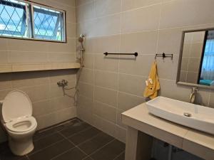 Koupelna v ubytování Vi Homestay - Luak