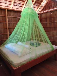 Postel nebo postele na pokoji v ubytování Moria Homestay