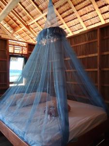 Postel nebo postele na pokoji v ubytování Moria Homestay