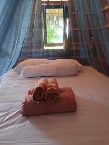 Postel nebo postele na pokoji v ubytování Moria Homestay