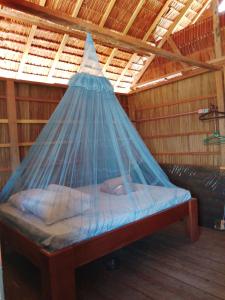 Postel nebo postele na pokoji v ubytování Moria Homestay