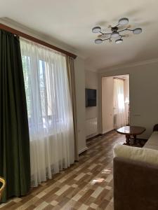 Posezení v ubytování TAGANI Guest House
