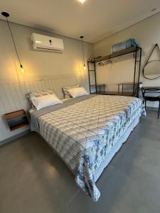 Ένα ή περισσότερα κρεβάτια σε δωμάτιο στο Loft Novo