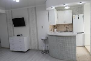 Kuchyň nebo kuchyňský kout v ubytování KMOD Studio + 10 fotografií