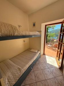 Postel nebo postele na pokoji v ubytování Casa Perla e Conchiglia