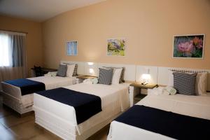 Postel nebo postele na pokoji v ubytování Matiz Igaratá Resort, Spa e Eventos