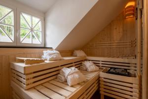 Postel nebo postele na pokoji v ubytování Ferienhaus Tante Martha