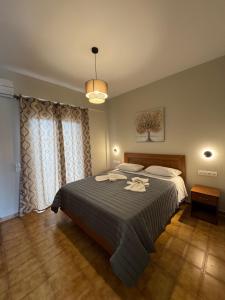 Postel nebo postele na pokoji v ubytování Jasmine Hotel & Apartments