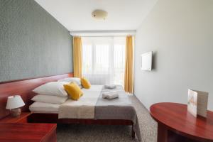 Postel nebo postele na pokoji v ubytování ALKA Sun Resort