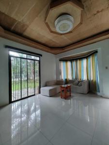 Fotografie z fotogalerie ubytování The Red Roof v destinaci Batuan