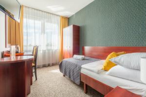 Postel nebo postele na pokoji v ubytování ALKA Sun Resort