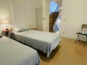 Posteľ alebo postele v izbe v ubytovaní Perfect getaway house 50m from Tamariu Beach -TF