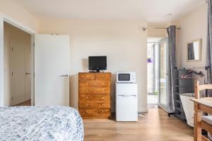 Η κουζίνα ή μικρή κουζίνα στο Comfy city room